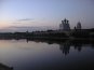 Вид вечером на реку Великую и Троицкий собор